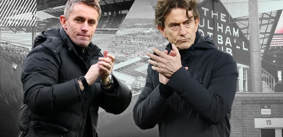Two football managers applauding in front of stadium