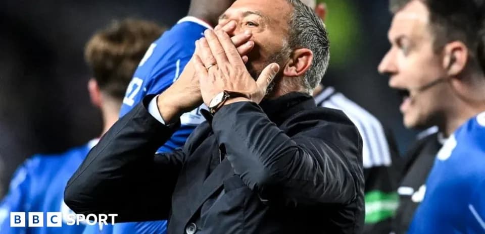 Manager reacting passionately during a match