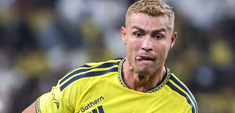 Player in yellow jersey running on the field
