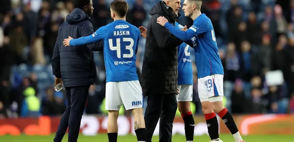 Rangers players and coach discussing after match