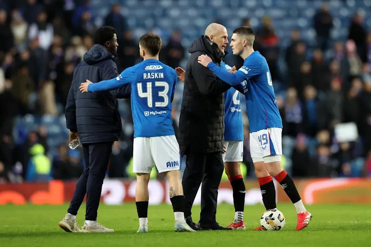 Rangers players and coach discussing after match