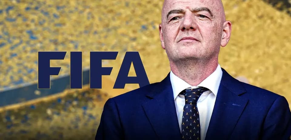 FIFA logo with official standing in front