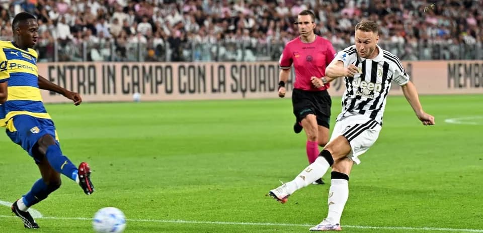 Juventus player shooting during match against Parma