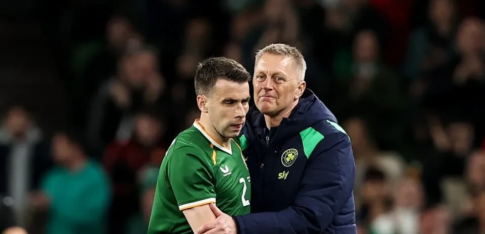 Player and coach during a football match moment