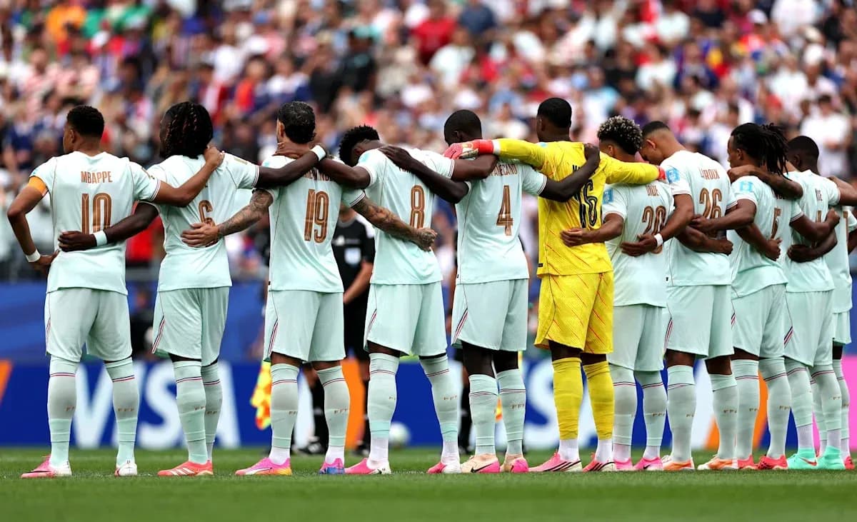 Players standing in a line with arms around each other