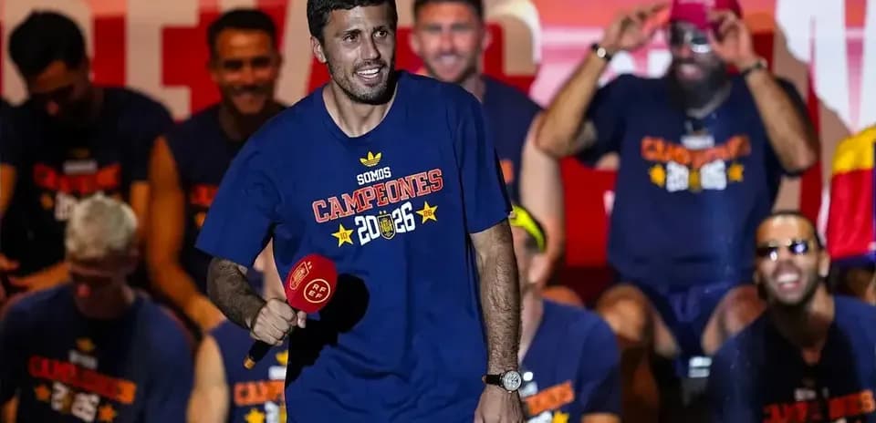 Player holding microphone during victory celebration event