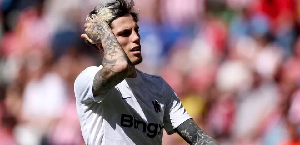 Player with tattoos during a match at stadium