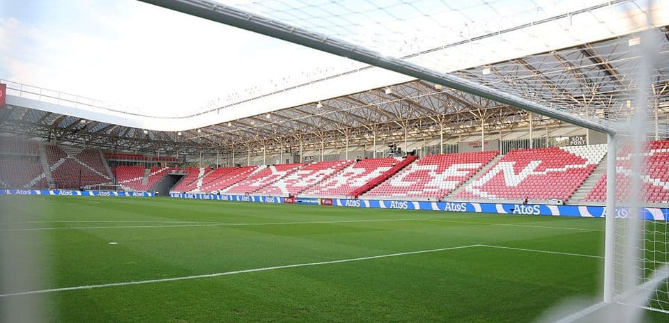 View of an empty stadium from behind the goal