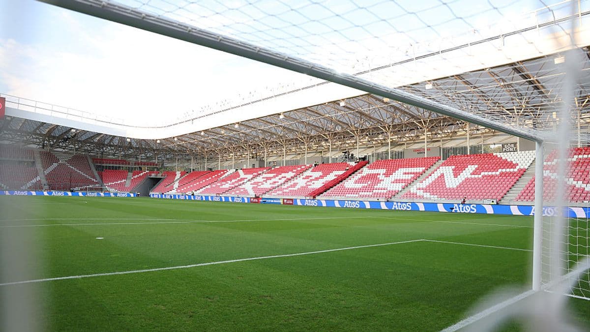 View of an empty stadium from behind the goal