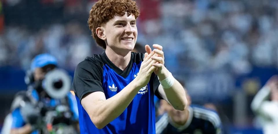 Player celebrating and clapping after match