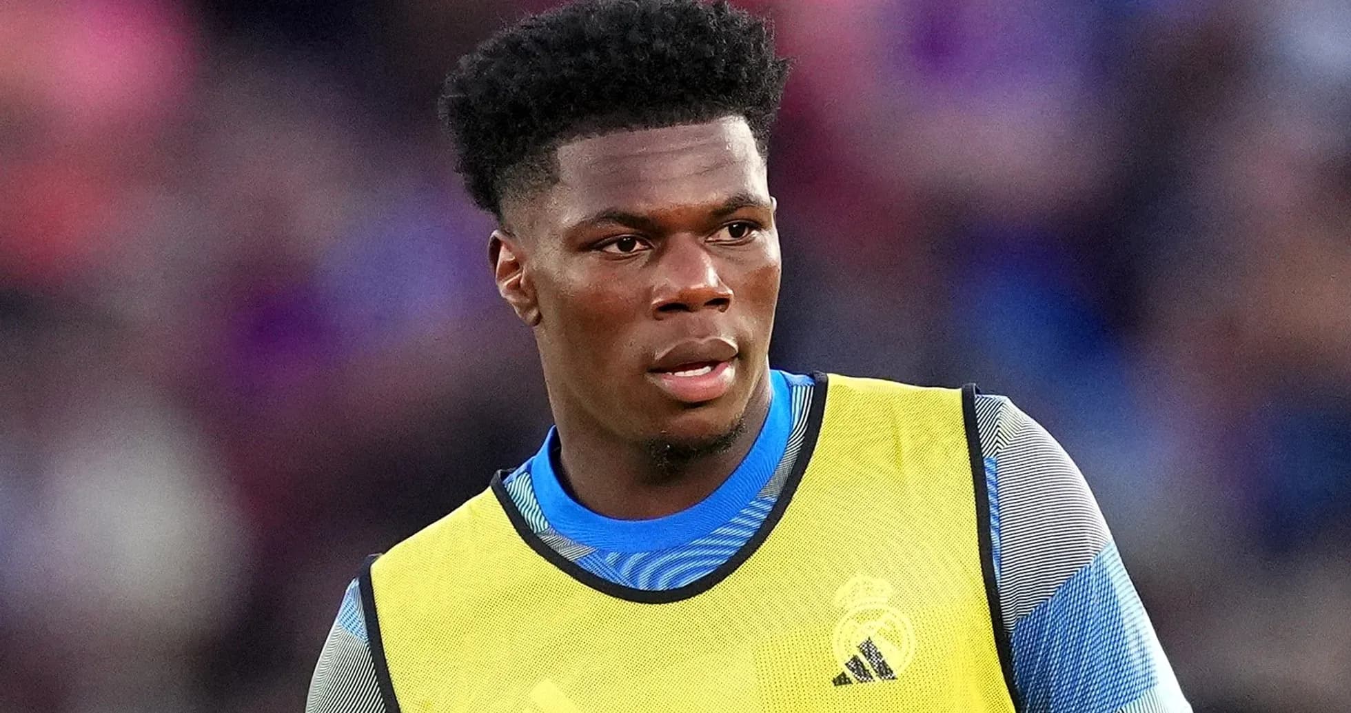 Player in training gear during match warm-up
