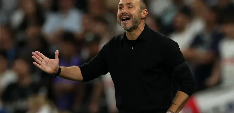 Coach gesturing during match from the sidelines
