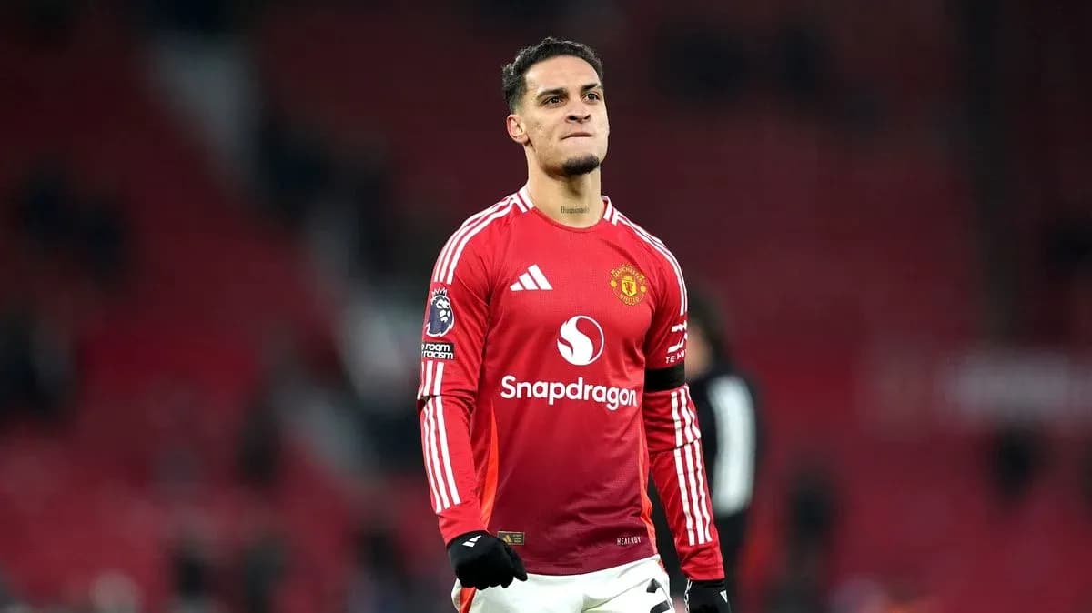 Player celebrating after match at Old Trafford
