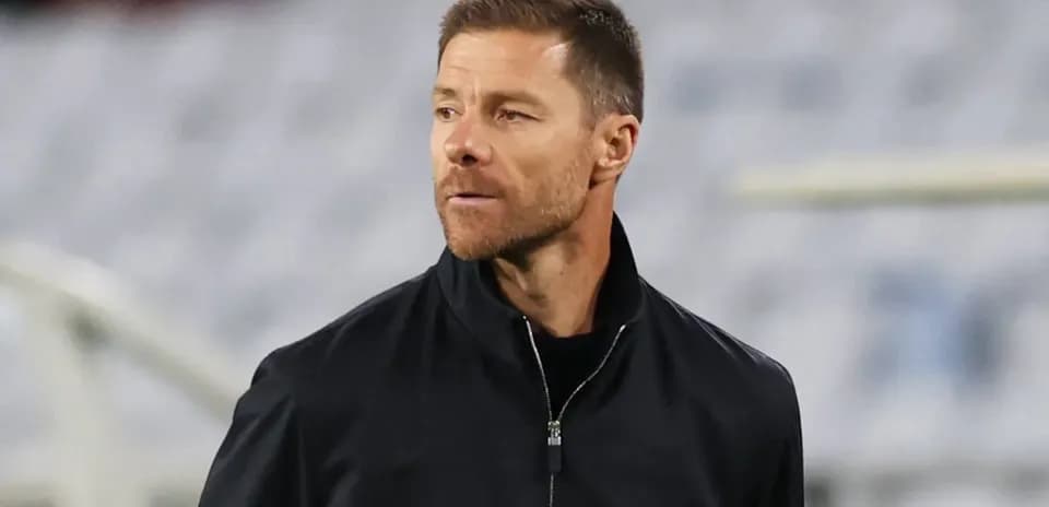 Coach observing during match from sideline