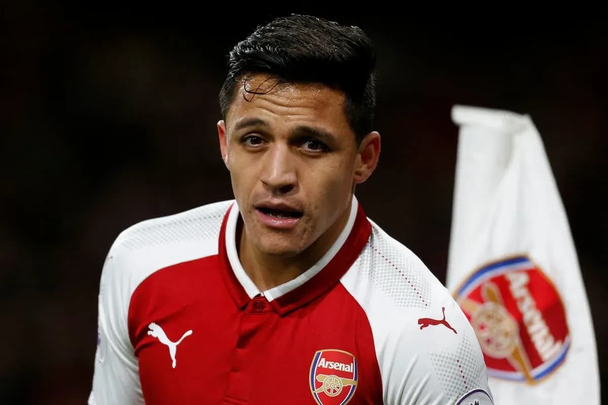 Player in Arsenal kit during match action
