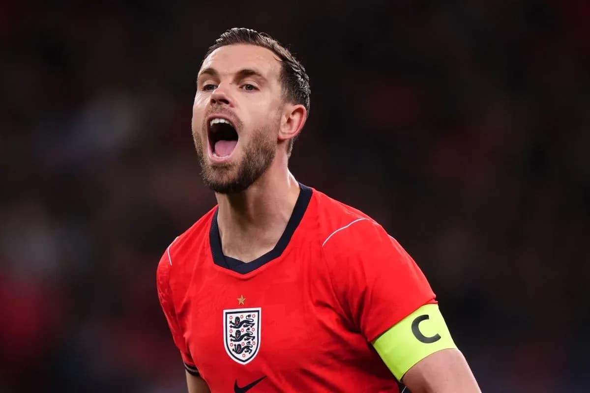 Player celebrating in England's red jersey and captain's armband