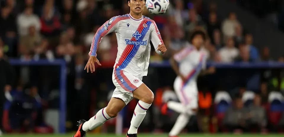 Player sprinting with the ball during match