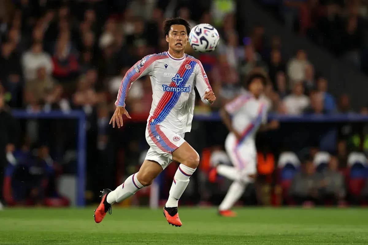 Player sprinting with the ball during match