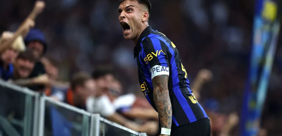 Lautaro Martínez celebrating with fans during match