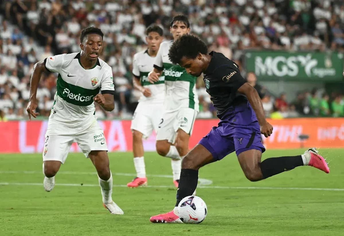 Player dribbling the ball during a football match