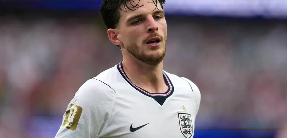 Player in England kit during football match
