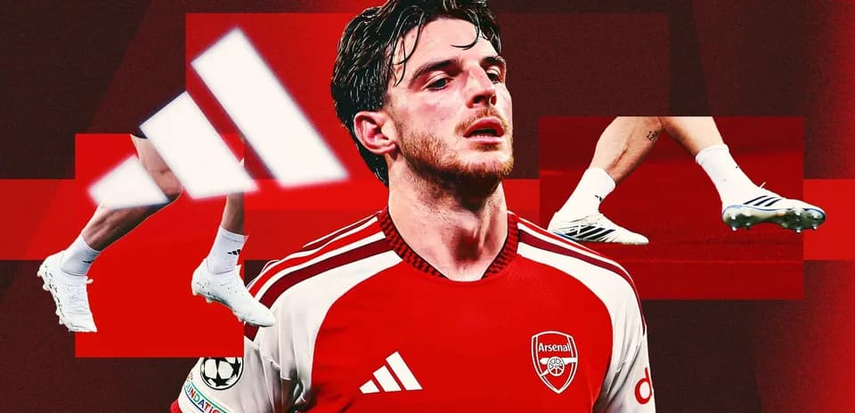 Player in Arsenal kit against red background