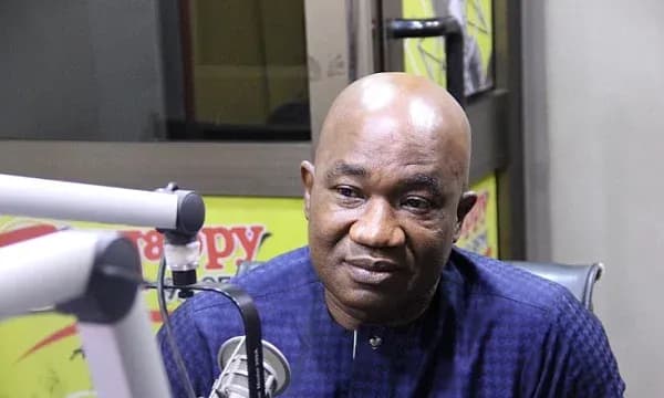 Man speaking during a radio interview in studio