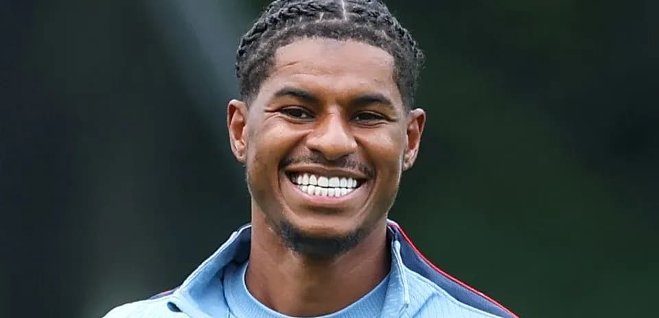 Player smiling during training session outdoors