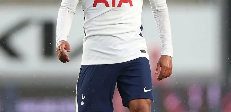 Player wearing Tottenham kit during a match