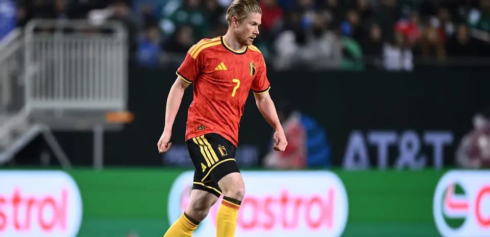 Belgian player dribbling during World Cup match