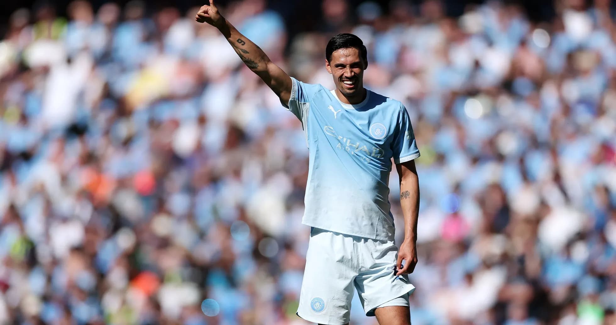 Player celebrating with thumbs up during match