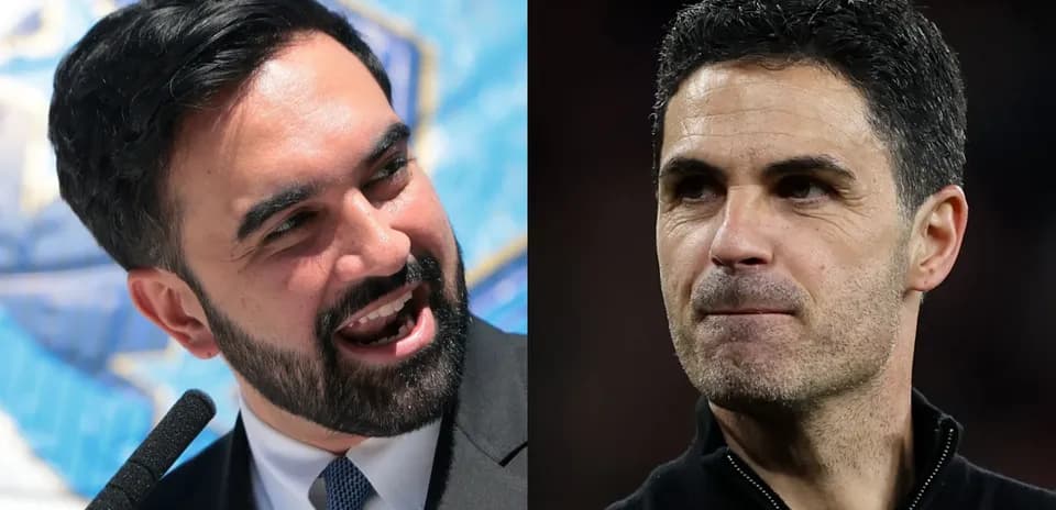 Two men, one speaking and one serious expression