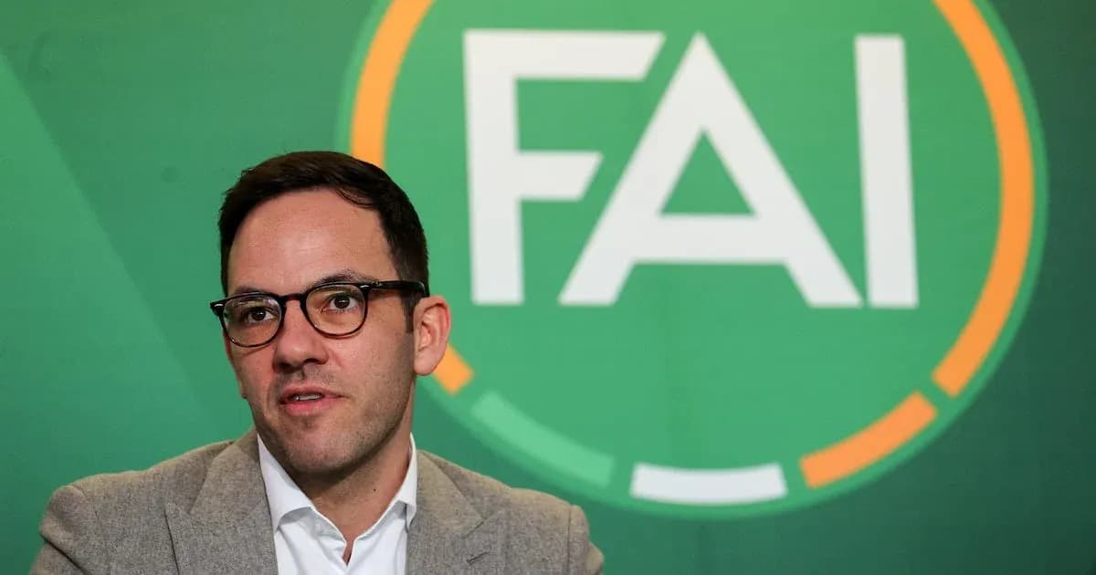 Official speaking at FAI press conference backdrop