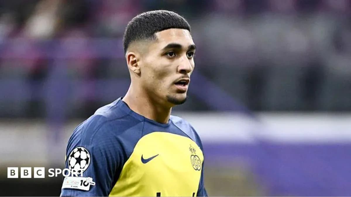 Player in training kit during a match warm-up