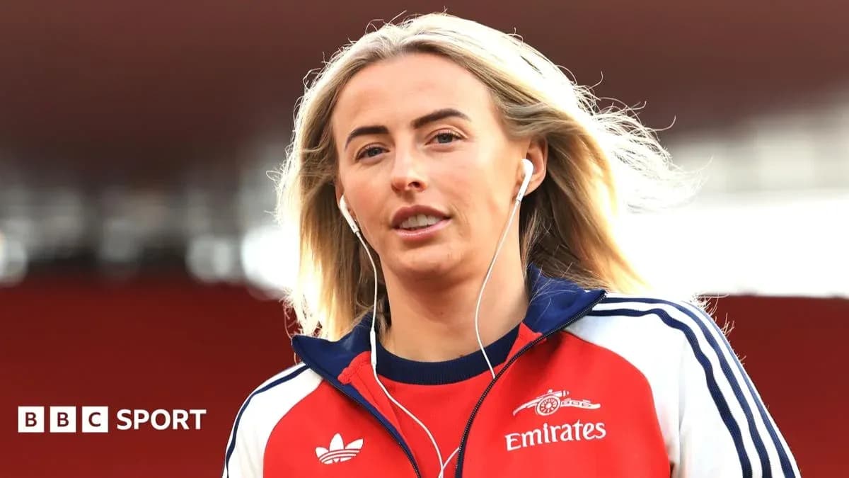 Player wearing headphones walking on the pitch