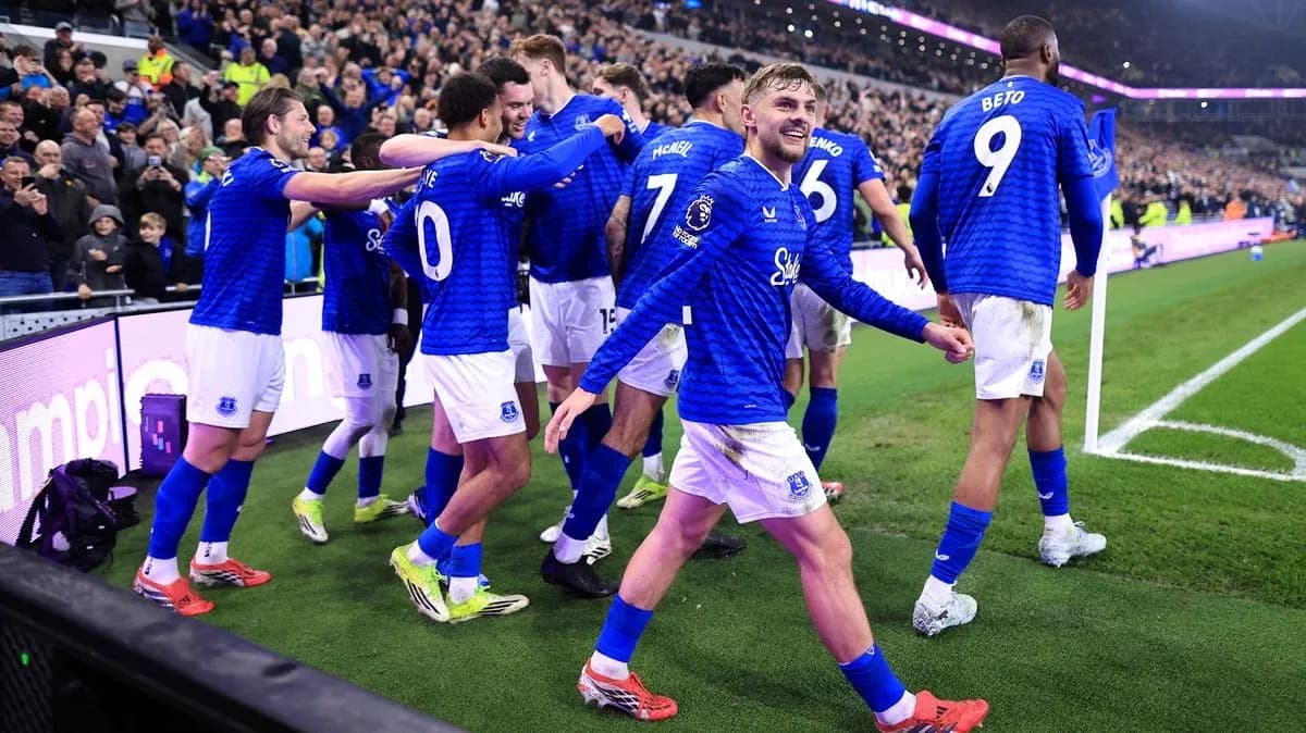 Everton players celebrating a goal on the pitch