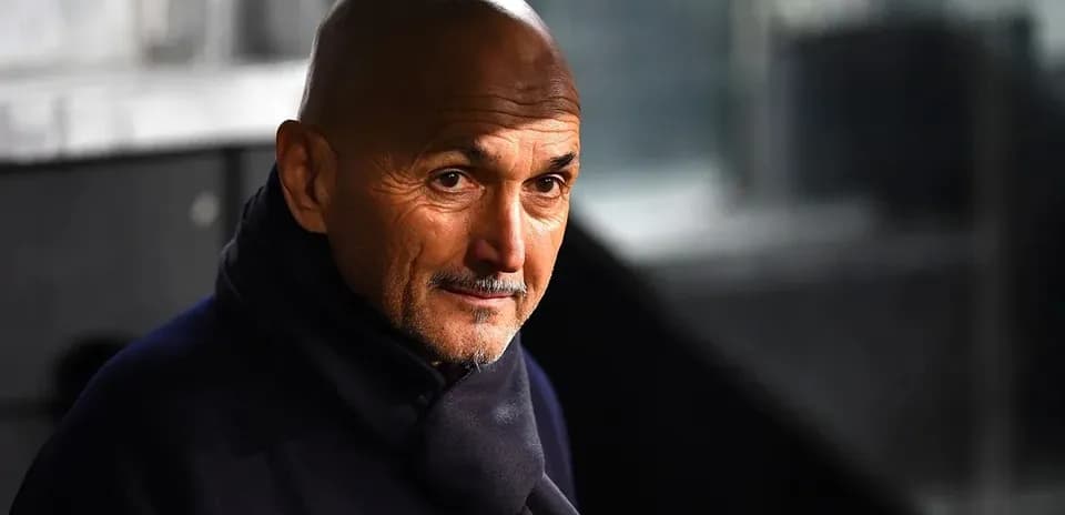 Coach looking on from the sidelines during match