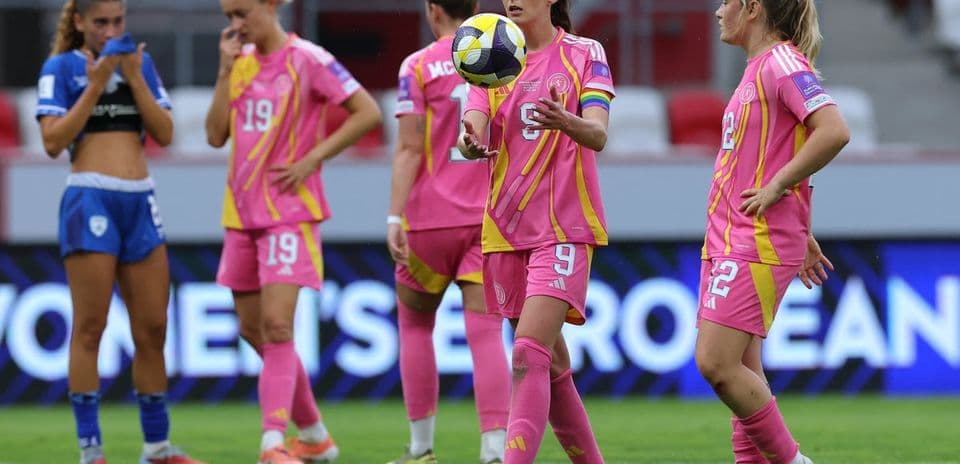 Players in pink and blue jerseys during a match