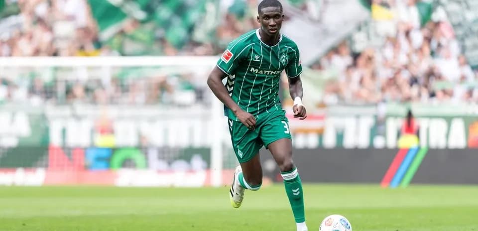 Player running on the pitch during a match
