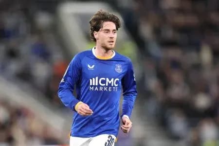 Player running on field in blue team kit