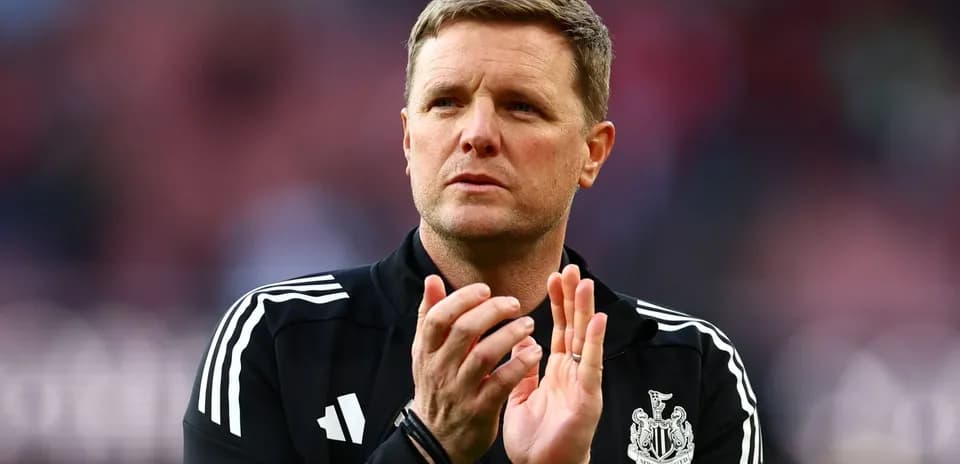 Newcastle United manager clapping on the sidelines