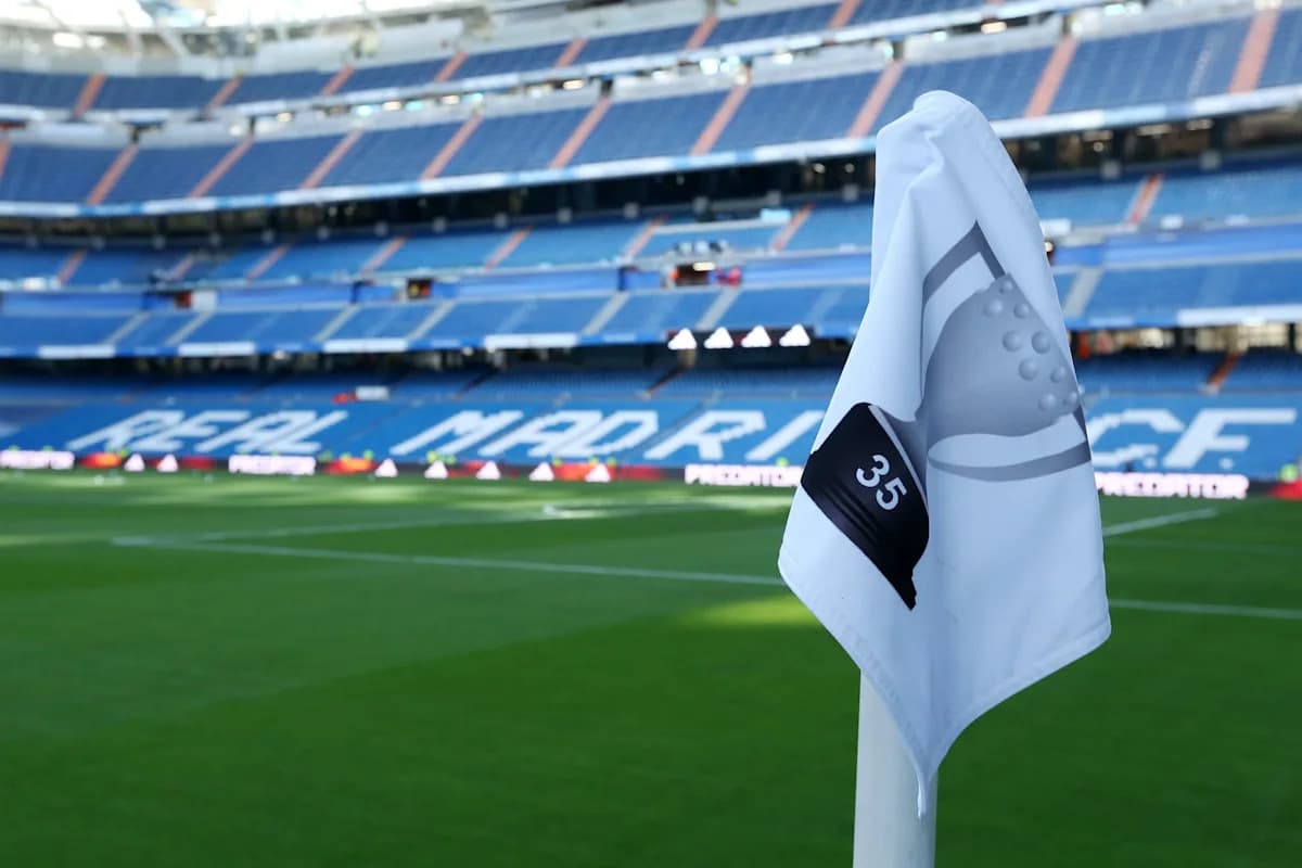 Corner flag in front of empty stadium seats