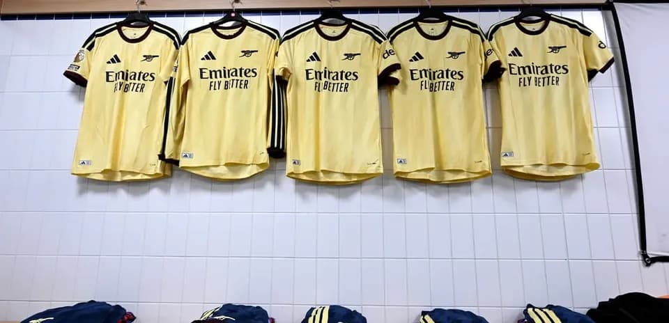 Arsenal jerseys hanging in the locker room