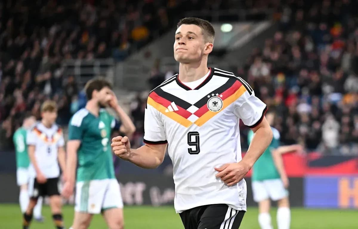 German player celebrating during a football match