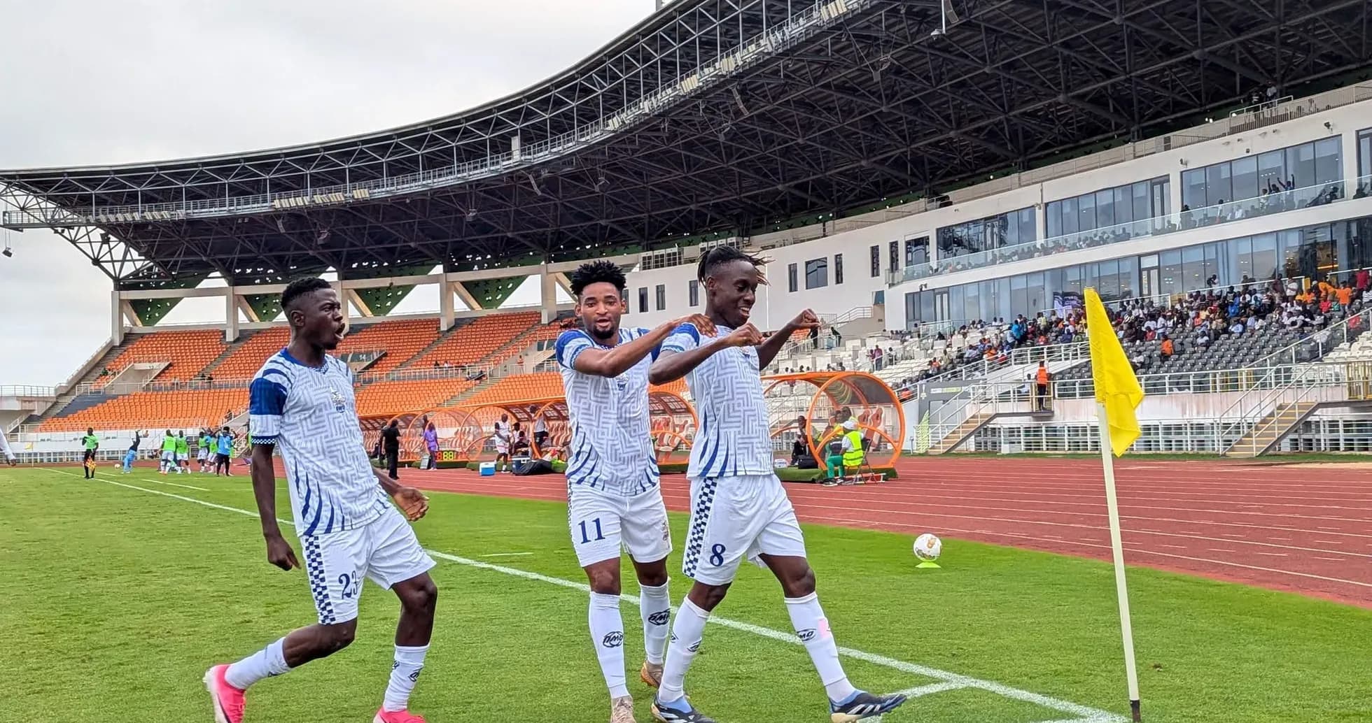 Players celebrating a goal during match