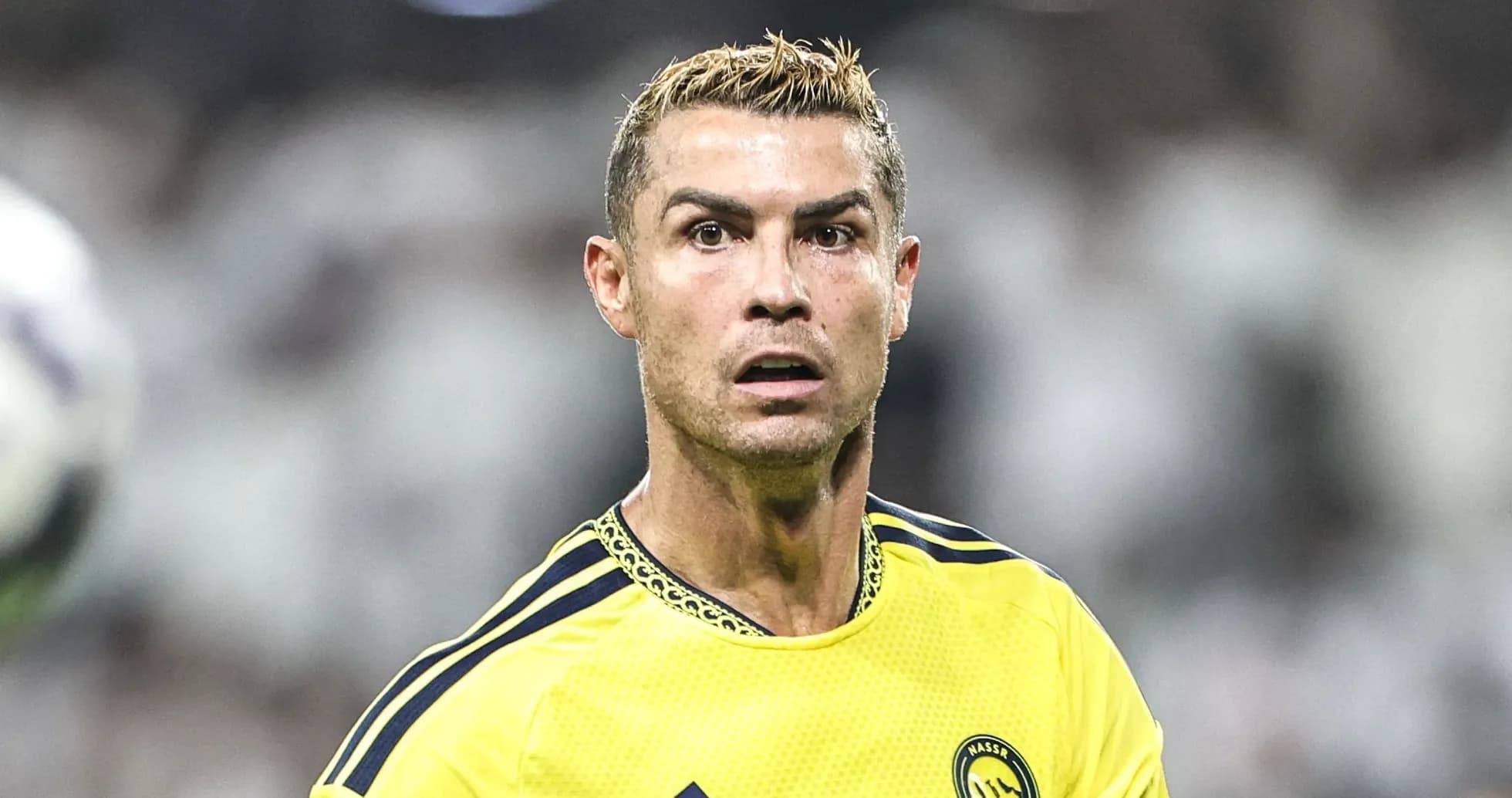 Cristiano Ronaldo in yellow kit during match