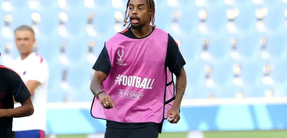 Player running during warm-up session in training gear