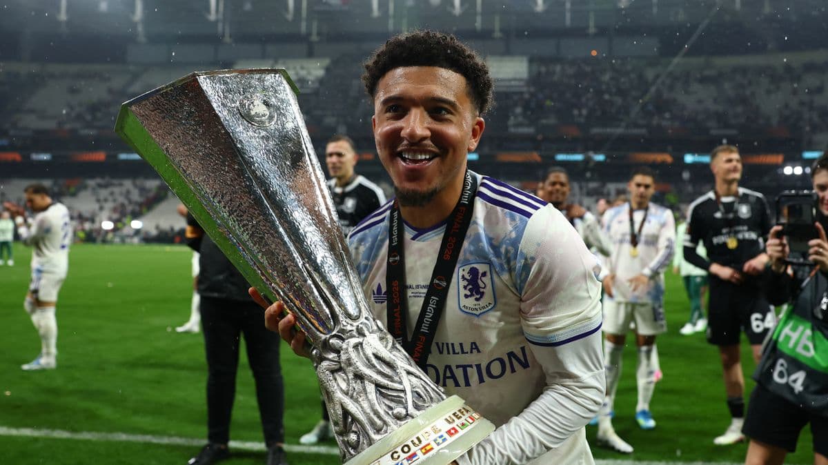 Player celebrating with trophy after match victory