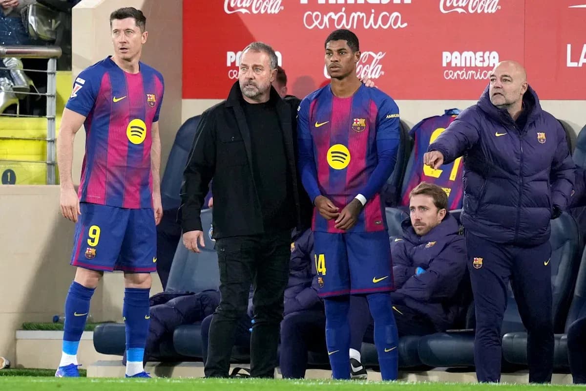 Barcelona players and staff during a match substitution