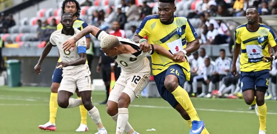 Orlando Pirates player battling for the ball